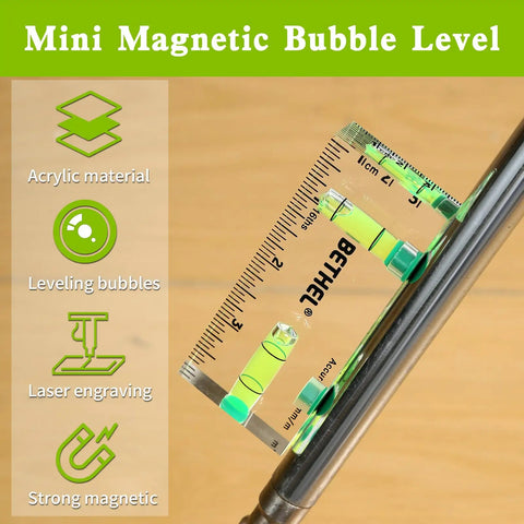Nifty Tiny Handheld Magnetic Bubble Spirit Level With Clear Acrylic Measure Stick on metal, showing leveling bubbles and ruler.