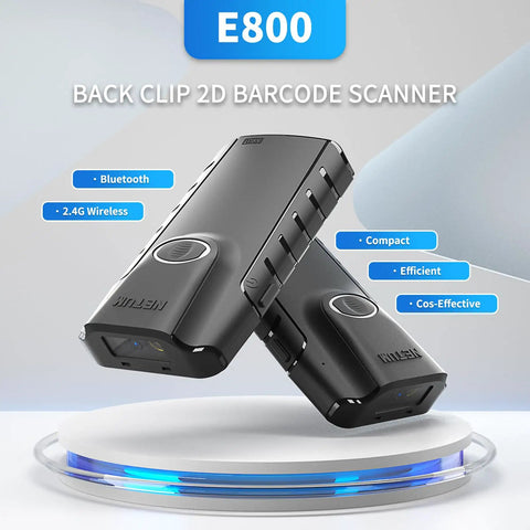 2D Bluetooth Barcode Scanner E800 Portable Gun Style 3 In 1 QR Reader With Back Clip for tablet and phone displayed on stand.