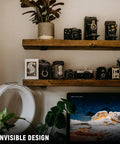 Heavy Duty 6 Inch Floating Shelf Brackets Six Pack Rustic Industrial T Type Hidden Metal Brackets 1/5 Inch Thick Ultra Slim Invisible Mounting For Wall Shelves Strong Support With Modern Versatile Design displayed with vintage cameras on shelves against a wall.