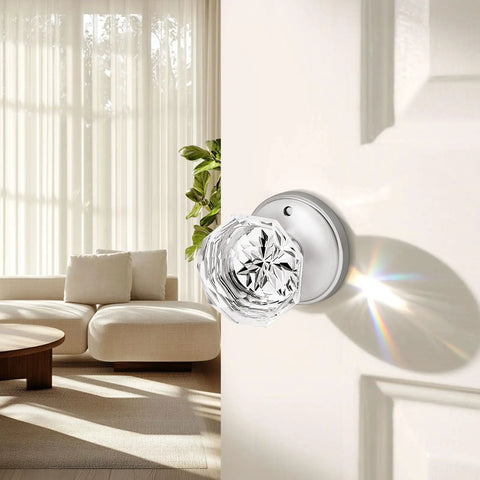 Five Pack Privacy Door Knobs With Clear Glass Handles In Satin Nickel Finish, interior view on a door with soft natural light