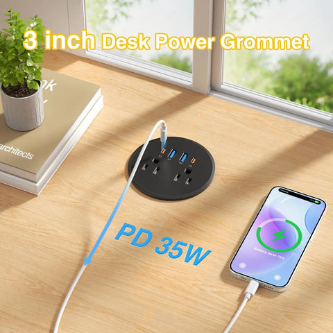 Three Inch Desktop Power Grommet With 35W USB C Fast Charging And Dual 18W USB A Outlets Black Six Foot Cord on a wood desk.