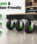 Heavy Duty 10 Inch Pneumatic Caster Set With Two Swivel And Two Rigid Black Rubber Wheels on a cart, showcasing low noise and floor-friendly design.