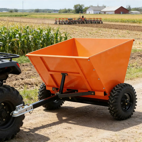 Beefy 71 Gallon Tow Behind Sand And Gravel Spreader For ATV And UTV attached on a dirt path in a rural setting