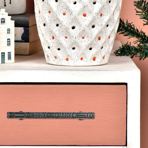 Zinc Alloy Cabinet Pull Handles For Kitchen And Bath on peach drawer, knurled retro design, durable vintage door pull