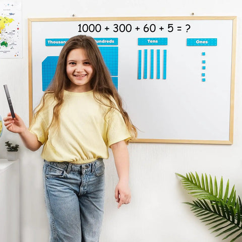 Child using 131 And 4 Piece Jumbo Blue Magnetic Base Ten Blocks Set With Headings For Math on whiteboard