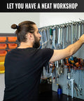 Man organizing tools using Garage Organizer Bins 30 Piece Wall Mount Storage Kit With Pegboard And Screws Real Handy Small Parts Bins