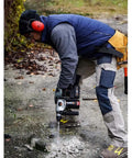 Built Different Heavy Duty Cordless Rotary Hammer Drill With Brushless Motor And Variable Speed Trigger Packing Serious 2.2 Joules in use on masonry.