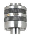 Close-up of MT4 live center for lathe; knurled steel body with D414 marking