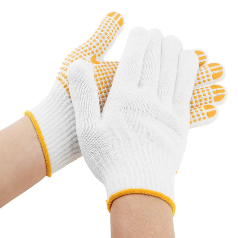 White knitted work gloves with yellow grip dots on fingers and wrist hem