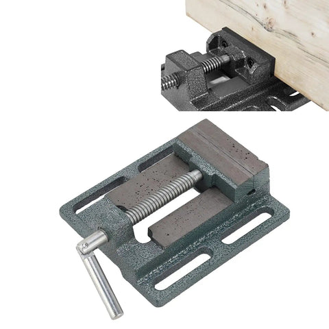 Beefy 3 Inch High Carbon Steel Drill Press Vise with raised widened jaws demonstrating superior clamping on wooden piece