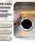 Person using Extended Grip Garbage Disposer Unjamming Wrench For Waste King And Moen Disposals in a kitchen sink drain.