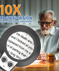 Elderly man using 2 In 1 LED Magnifier With Light Desk Lamp Clamp Stand For Crafting And Soldering, 10x Magnification.