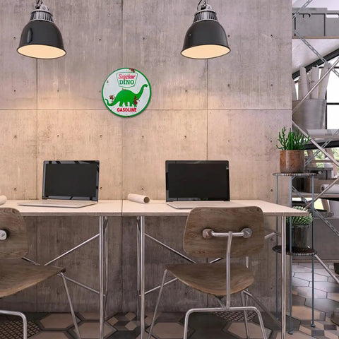Badass Vintage Tin Sign Featuring Classic Sinclair Gasoline Poster Round Galvanized Metal Wall Art in modern workspace.