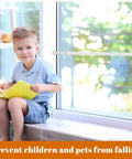 Child sitting by window with adjustable sliding glass door security bar installed for extra protection.