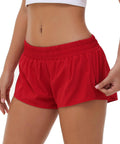 Ultra Lightweight Women Running Shorts with elastic waistband and zip pocket, red color, showing detail view.