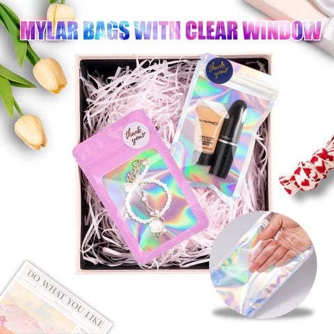 Gift box containing Mylar bags with clear window for cosmetics and jewelry, part of 100 Pack Holographic Mylar Resealable Bags 3x3 Inch With Clear Window For Candy Snacks Small Biz Storage Smell Proof Packaging Black Color Great For Giftable Display And Freshness