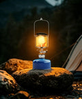 Portable Propane Gas Lantern For Camping With Copper And Stainless Steel Construction on rock at campsite