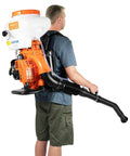 Man wearing Mist Duster Backpack Sprayer 43cc Gas Powered Garden Blower with 14 Liter Tank Compact Chemical Tank System Stable Low Center of Gravity CDI Ignition Recoil Start Workhorse Lawn Care Tool