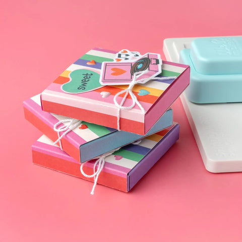 Stack of colorful shadow boxes made with Shadow Box Paper Punch Board For DIY Crafts And Card Making Creates 2 To 5 Inch Shadow Boxes.
