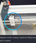 Close-up of magnetic switch on Top Notch Pneumatic Liquid Filling Machine With 30 Liter Hopper, easy operation for adjusting fill amounts.