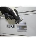 Gloved hand locking the drawer of Beefy Heavy Duty Tear Down Table Workbench With Drain, Steel Work Surface And Built In Containment Basin.