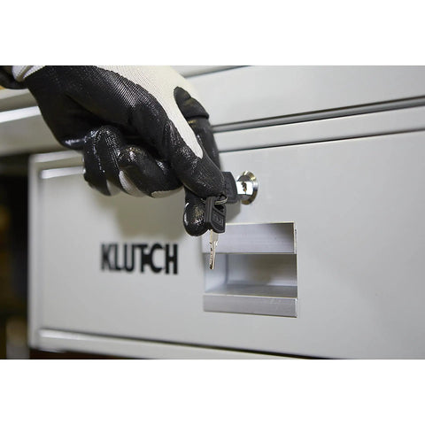 Gloved hand locking the drawer of Beefy Heavy Duty Tear Down Table Workbench With Drain, Steel Work Surface And Built In Containment Basin.