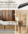 2 Pack Black Aluminum Barn Door Handles With 5 Inch Center Hole Sliding Closet Door Pulls For Wardrobe Cabinet Garage Gate 148mm L X 25mm W Rust Resistant Includes Four 16mm Screws And A Screwdriver installed on cabinets and doors showing application.