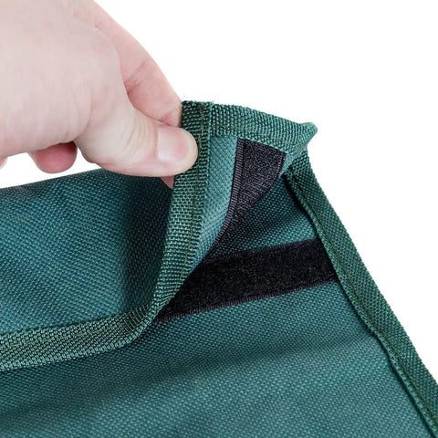 Close-up of green tool pouch fabric with velcro, part of the 2 In 1 Garden Kneeler Bench With Tools Pouch Folding Garden Stool.