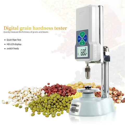 Handheld Digital Hardness Tester And Sclerometer For Corn Wheat Coffee And Feed Dead On Accuracy With Easy Grip Body, displaying grains.