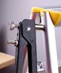 Close-up of a Beefy Heavy Duty Blind Rivet Nut Tool Kit with Hand Riveter attached to a metal ladder.