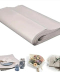 Stack of white Moving Packing Paper Sheets 31 By 21.5 Inches, 50 Pack Newsprint Paper For Wrapping Fragile Dishes And Glassware