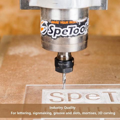 Carbide CNC Router Bits Set with Quarter Inch Shank used for engraving on a clear surface, close-up view.
