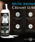 Rich Creamy White Water Based Body Glide With Musk Inspired Scent, Thick Slick Texture, 8.5 Oz, non-staining formula bottle.