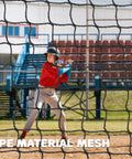 Player batting behind Heavy-Duty Backyard Batting Cage Net 55x12x12ft Weatherproof Polyester Construction for All Weather Baseball