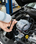 Ultimate 200Cc Fluid Extractor Pump For Oil Gas Power Steering Brake And Transmission draining fluid from an engine tank.