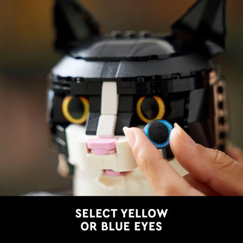 Dope Tuxedo Cat Building Set And Adult Craft Kit For Killer Home Decor Super Slick Display Figure showing customizable eyes in hand.