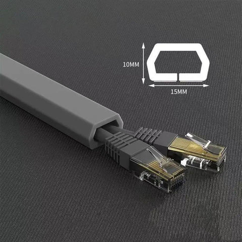 Heavy Duty PVC Floor Cable Cover To Kick Trip Hazards To The Curb Low Profile Gray Trapezoid Wire Raceway with cords inside.