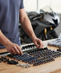 Motorcycle Fairing Bolt Kit With 195 Piece Fastener Set Clips And Screws Universal Fit 304 Stainless Steel Rust Resistant Burnt Blue Finish laid out on table