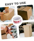 Fragile Warning Packing Tape Set With 5 Rolls, Heavy Duty Shipping Tape used on cardboard boxes, showing adhesive and handle with care label.