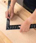 Person using Must Have Pro Grade 16 By 24 Steel Framing Square With Rafter Tables For Woodworking And Construction on wooden surface