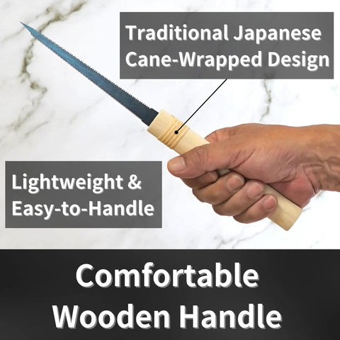 Hand gripping a lightweight 4 3/4 inch Zero Hassle Japanese Pull Saw Keyhole Blade with traditional cane-wrapped grip.