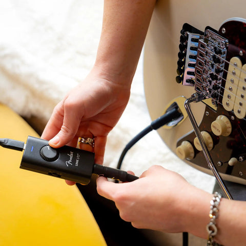 Person using Pocket Sized USB-C Audio Interface With Pristine Bi-Directional Audio For Home Studio And On The Go Recording Ultra