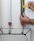Installing Foam Pipe Insulation Sticks For Hot And Cold Water Lines Pre Slit With Self Sealing Edge 0.75 Inch By 1 Foot Black