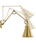 Swing Arm Wall Lamp In Warm Brass Gold Finish With Up And Down Lighting Adjustable Metal Shade For Bedroom Nightstand Reading Hardwired Living Room Hallway Kitchen Decor, shown in adjustable positions.
