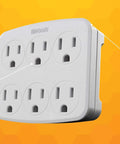 Six Outlet Wall Adapter Turns One Outlet Into Six Grounded Ports With Built In Phone Cradle Space Saving White Electrical Outlet Extender