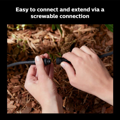 Hands connecting the Outdoor 8 Foot Low Voltage Light Cable With T Connector For Easy Landscape Lighting Setup, Weatherproof