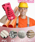 Front view of pink PVC pipe deburring tool held by worker with PVC pipes in background.