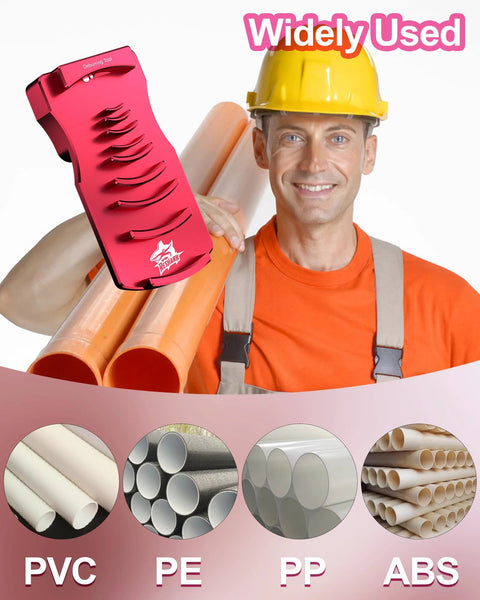Front view of pink PVC pipe deburring tool held by worker with PVC pipes in background.
