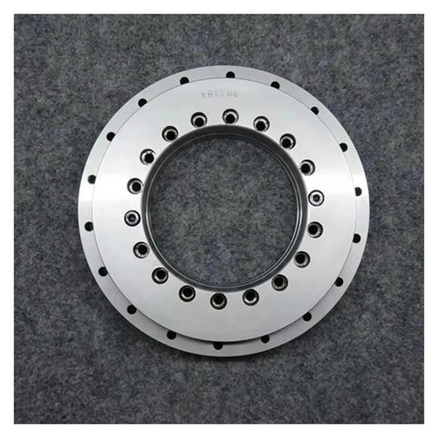 Precision YRT100 Rotary Table Bearing 100 X 185 X 38mm showing smooth surface and bolt holes for mounting on CNC machines.