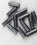 Bike Cable Ferrule End Caps Set For 5mm Brake Cables And 4mm Shift Cables arranged on textured surface